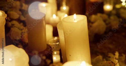 Candle light in front of the window at night with bokeh