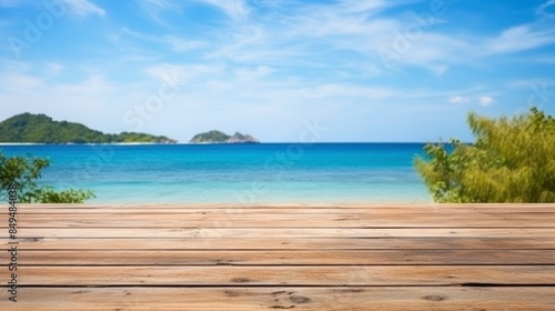 Wood table top on blur beach background