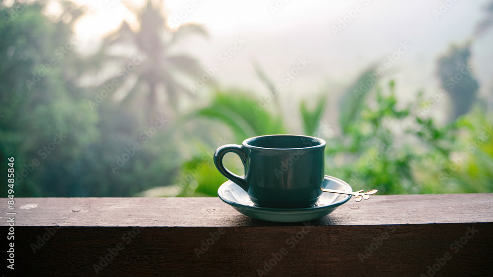 Serene morning with a cup of coffee overlooking a lush garden Serene morning with a cup of coffee overlooking a lush garden