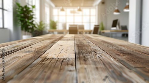 empty and clean wooden table with blurry office room