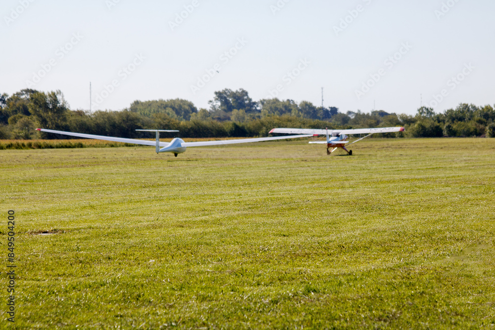 airplane and glider taking off airplane and glider taking off