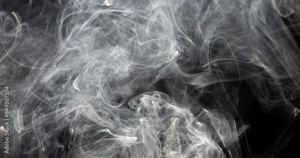 Smoke on a black background. Gray smoke in case of fire. Natural texture. Cigarette smoke. Smoke on a black background. Gray smoke in case of fire. Natural texture. Cigarette smoke.