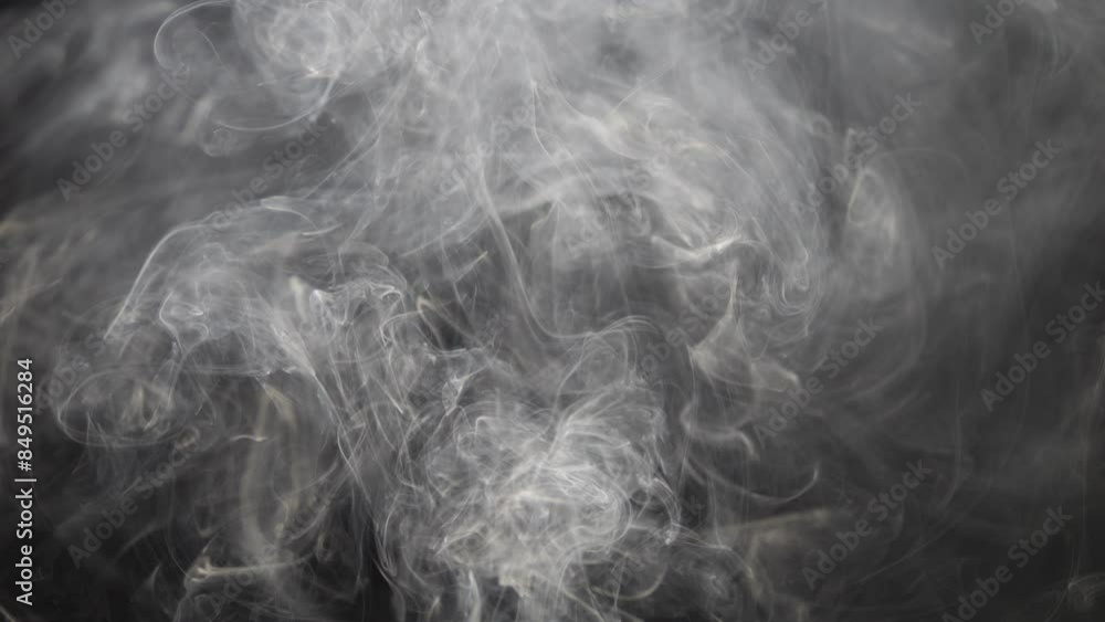 Smoke on a black background. Gray smoke in case of fire. Natural texture. Cigarette smoke. Smoke on a black background. Gray smoke in case of fire. Natural texture. Cigarette smoke.