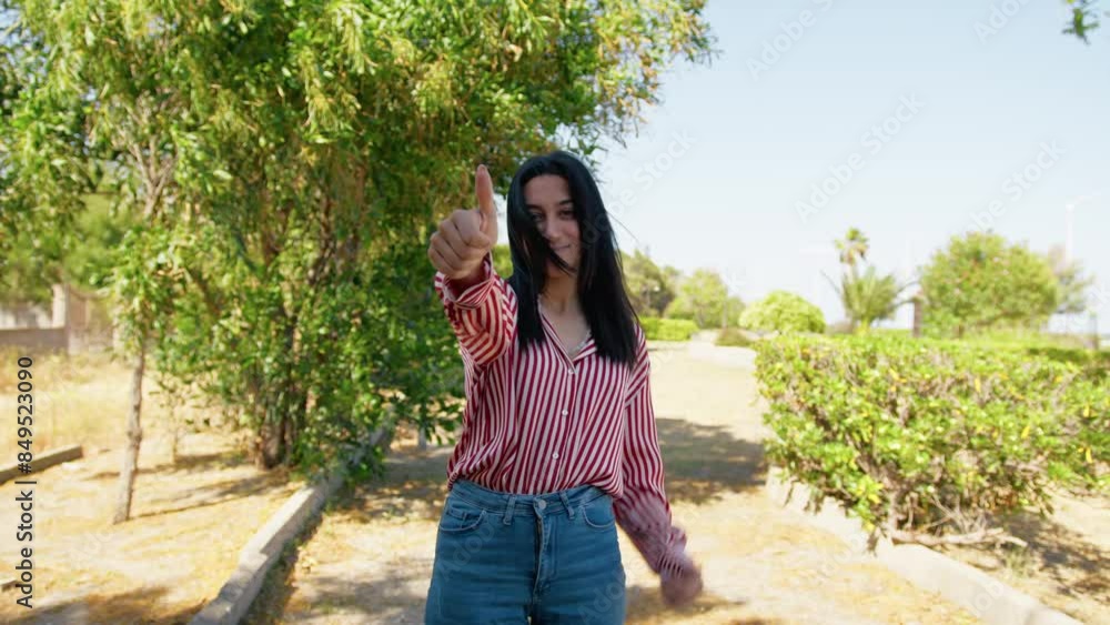 Thumbs Up For A Woman In The Park Thumbs Up For A Woman In The Park