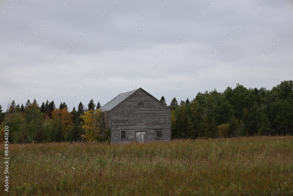 abandoned farm house in a meadow of tall grass prairie abandoned farm house in a meadow of tall grass prairie