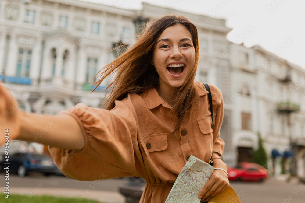 Fototapeta premium stylish young woman dressed in spring trendy dress
