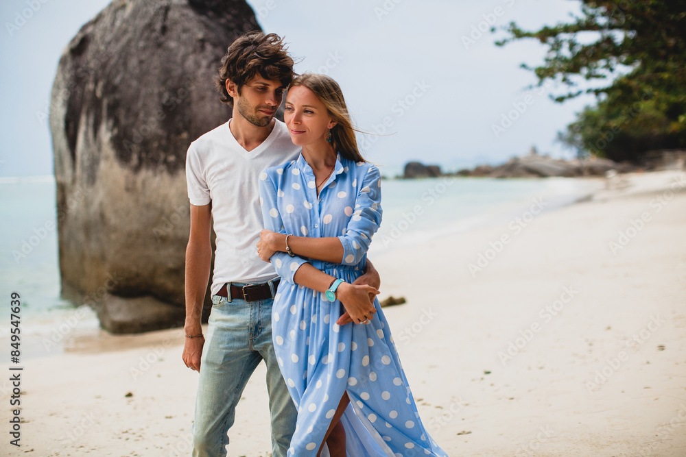 young stylish hipster couple in love on tropical beach young stylish hipster couple in love on tropical beach