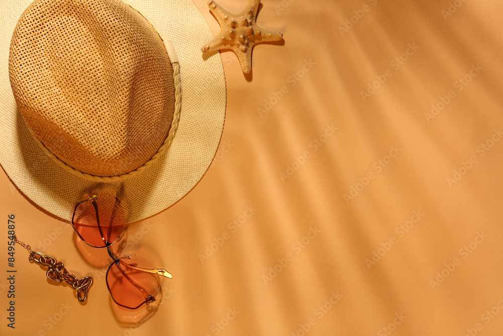 Stylish hat, sunglasses and bracelet on color background Stylish hat, sunglasses and bracelet on color background