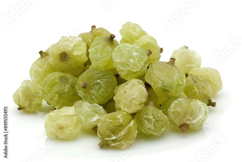 Alma fruits - dried and green over white background