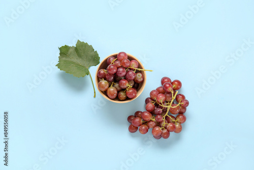 Fresh red grapes in wooden ...