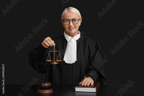 Mature female judge with sc...