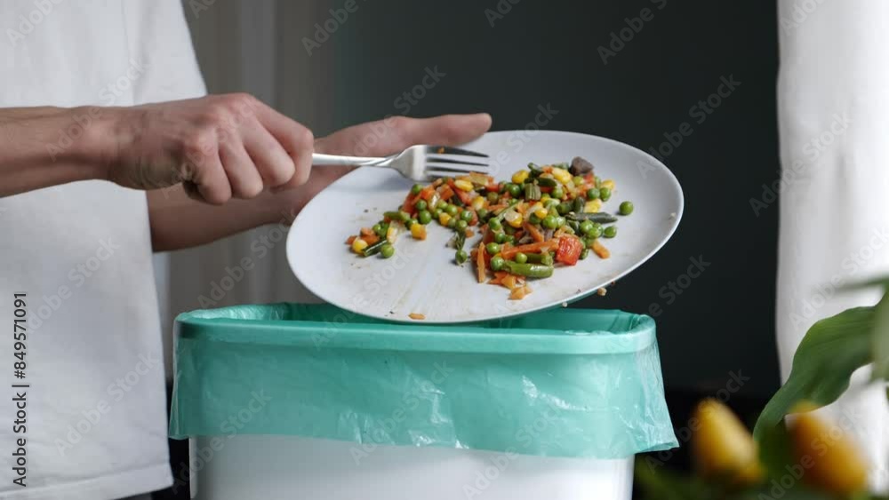 Recycling Food Waste at Home. Composting of organic waste. Leftovers are sorted and thrown into the compost bucket. A sustainable cycle