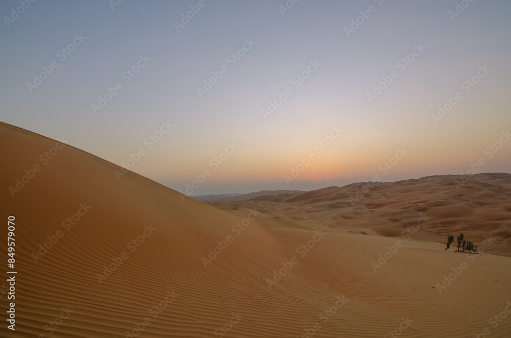 Sunset in the desert of Abu Dhabi in Emirates Sunset in the desert of Abu Dhabi in Emirates