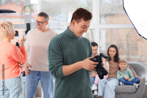 Male photographer with came...
