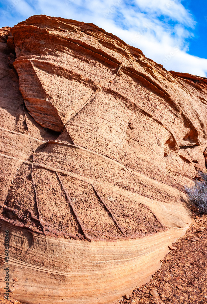 Obraz na plátně Layered weathered red sandstone rock formations