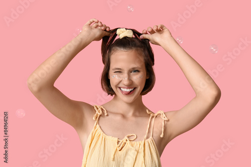 Teenage girl showing tongue...