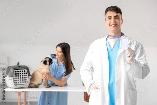 Portrait of male veterinarian in clinic