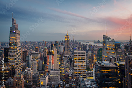 Aerial view of the Empire State Building and downtown Manhattan at dusk, New York City. 