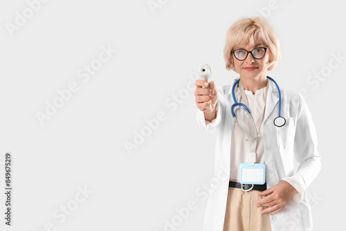 Female doctor with infrared...
