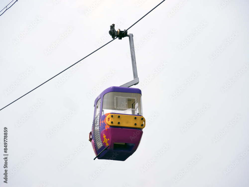 cable car with blue sky background. Cable car in Taman Mini Indonesia Indah cable car with blue sky background. Cable car in Taman Mini Indonesia Indah