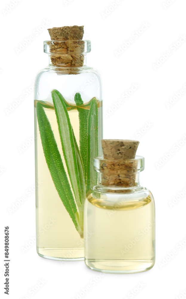 Bottles of rosemary essential oil isolated on white Bottles of rosemary essential oil isolated on white