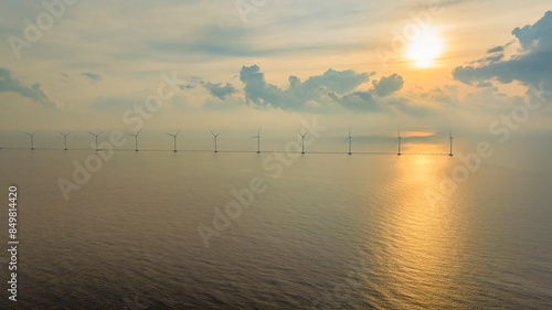 Wallpaper Mural Windmill park with clouds and a blue sky, wind mill turbines in the ocean aerial view of a wind farm in the Ba Dong beach, Tra Vinh, Vietnam production clean energy Torontodigital.ca