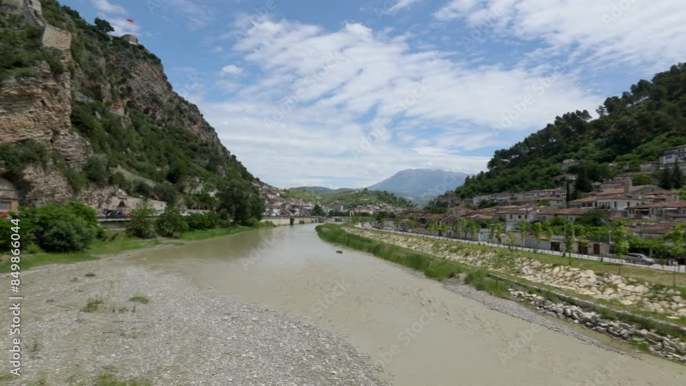 Tourist visit the Ottoman houses along the Osum River in the central Albanian city of Berat Tourist visit the Ottoman houses along the Osum River in the central Albanian city of Berat