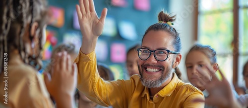 Happy Teacher High Fives a Student in Classroom