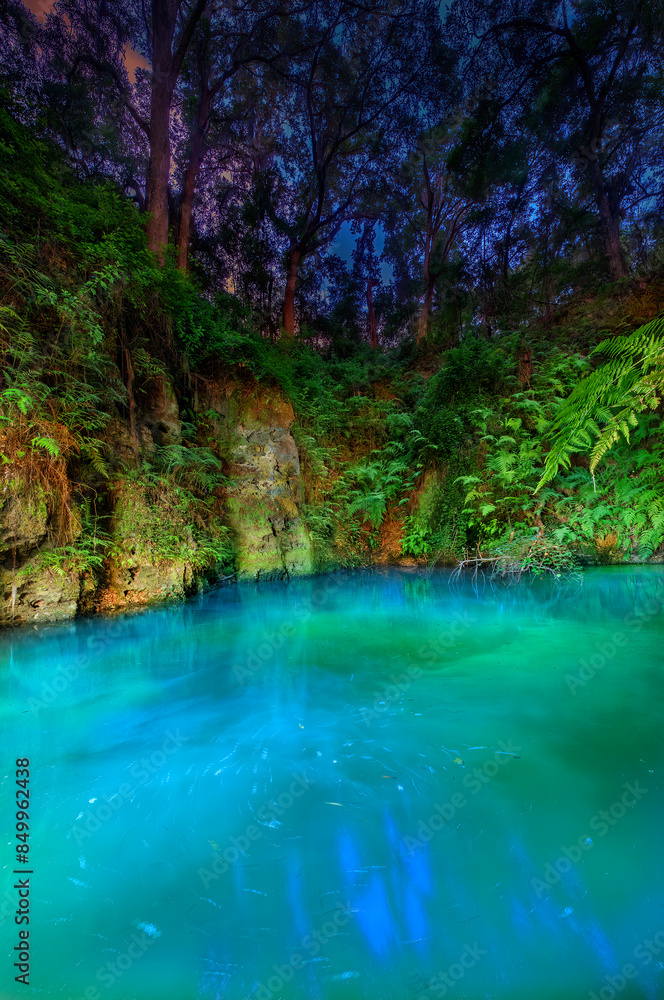 A Sink Hole Illuminated at Night in Florida A Sink Hole Illuminated at Night in Florida
