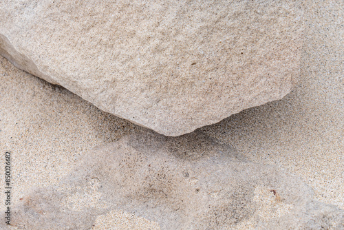 Cemented sand, Beachrock is a friable to well-cemented sedimentary rock. Keawaula Beach, Leeward Coast of Oahu, Hawaii photo