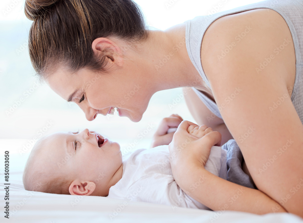 Baby, mother and playing on bed in home for bonding, love and support for child development. Family house, woman or mama with boy infant in nursery for laugh, connection and care for happy kid Baby, mother and playing on bed in home for bonding, love and support for child development. Family house, woman or mama with boy infant in nursery for laugh, connection and care for happy kid