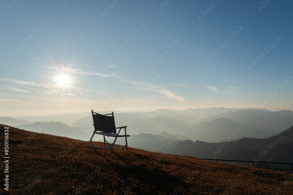 A armchair camping on the hill. Silhouette scene A armchair camping on the hill. Silhouette scene