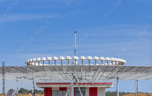 Ground station transmits DVOR (Doppler VHF Omni Directional Range) radio navigation system for planes allowing planes to plot their positions and direction  photo