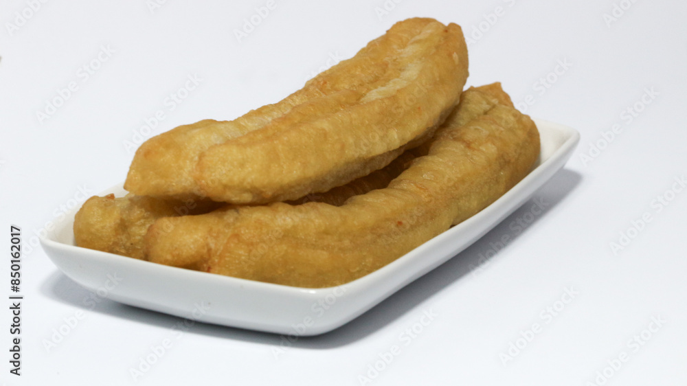 Youtiao (Cahkwe, Cakwe, Kueh, Kuay, Chinese Donut), Traditional Chinese Snack. Youtiao (Cahkwe, Cakwe, Kueh, Kuay, Chinese Donut), Traditional Chinese Snack.