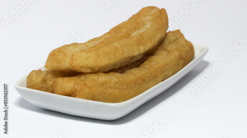 Youtiao (Cahkwe, Cakwe, Kueh, Kuay, Chinese Donut), Traditional Chinese Snack. photo