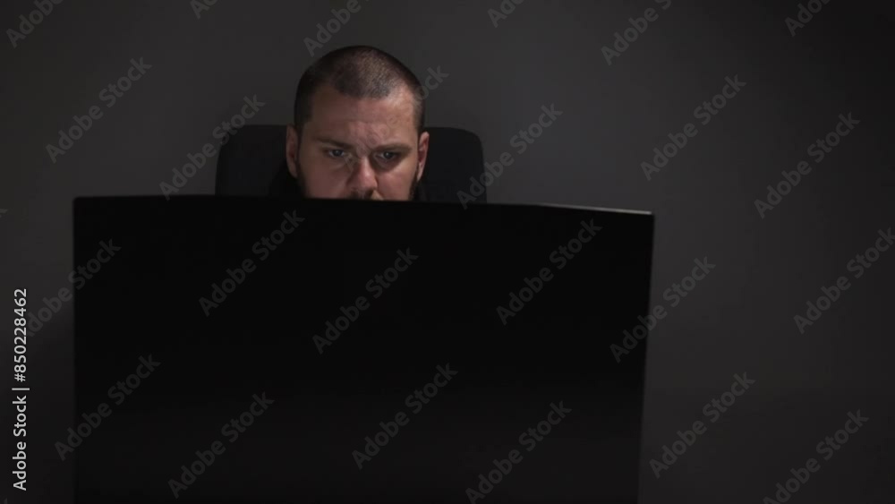Hacker, man in mask with laptop, dark web, illegal hacking, dangerous person. Hacker, man in mask with laptop, dark web, illegal hacking, dangerous person.