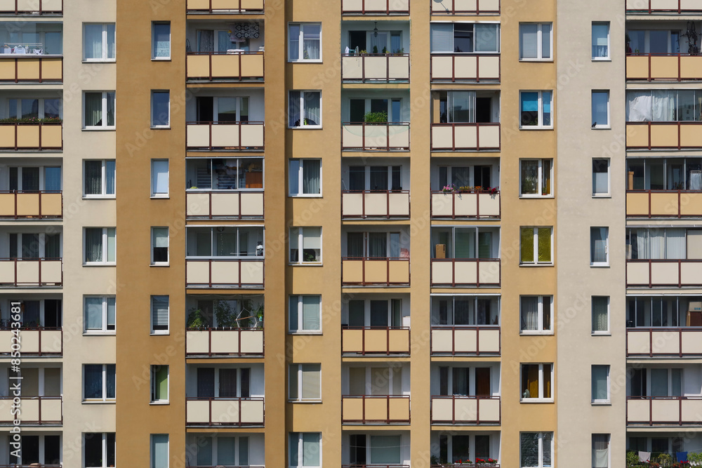 View of a block of flats with balconies; multi-apartment block; apartment building; thelarge panel system building View of a block of flats with balconies; multi-apartment block; apartment building; thelarge panel system building