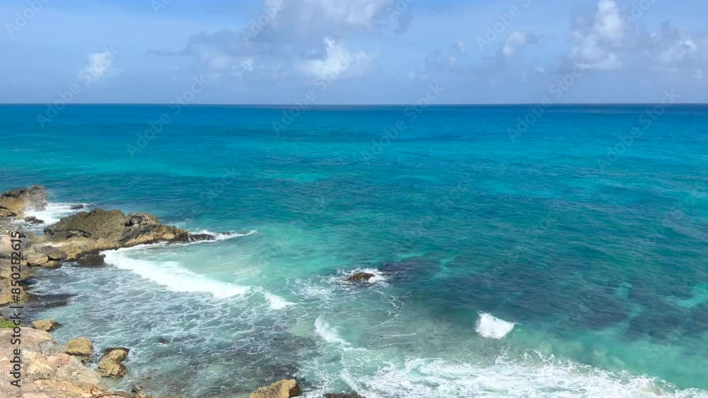 Waves on the crystal clear seawater. Caribbean sea. Atlantic Ocean. Waves on the crystal clear seawater. Caribbean sea. Atlantic Ocean.