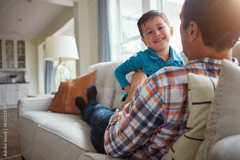 Home, happy and father with child on sofa for bonding, laughing and relax together on weekend. Family, playing and dad with young boy on couch for playful relationship, love and fun in living room Home, happy and father with child on sofa for bonding, laughing and relax together on weekend. Family, playing and dad with young boy on couch for playful relationship, love and fun in living room