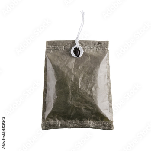 A transparent sealed tea bag with a string attached on a white background, png format photo