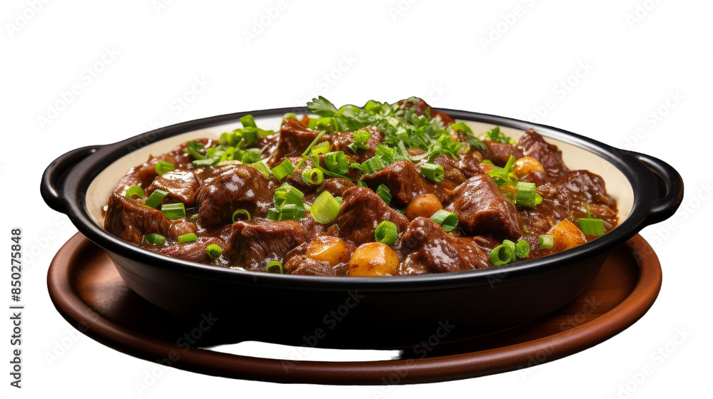 Stewed Beef With Potatoes and Green Onions in a Black Ceramic Serving Dish Stewed Beef With Potatoes and Green Onions in a Black Ceramic Serving Dish
