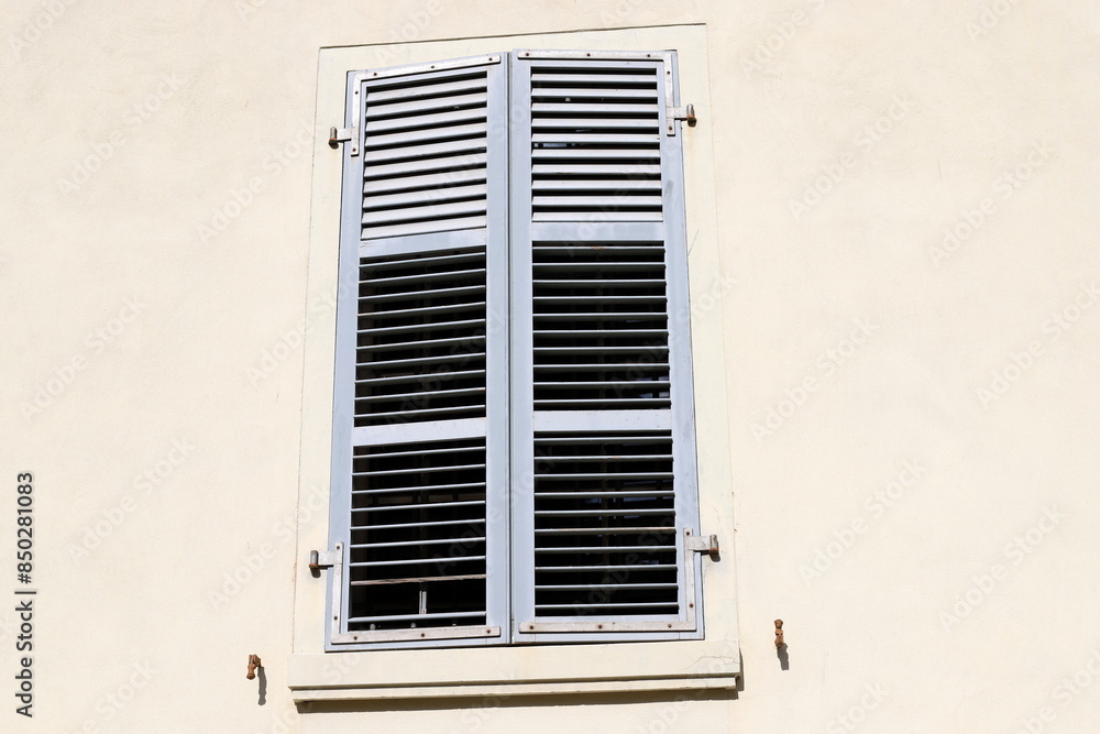 A small window as an architectural detail of housing construction in Israel. A small window as an architectural detail of housing construction in Israel.