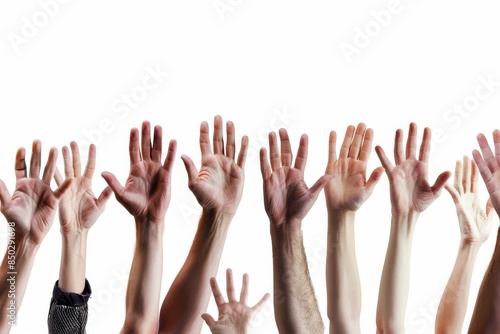 Multiple hands of different people reaching upward, shot against a white background, suggesting desire or need for help photo