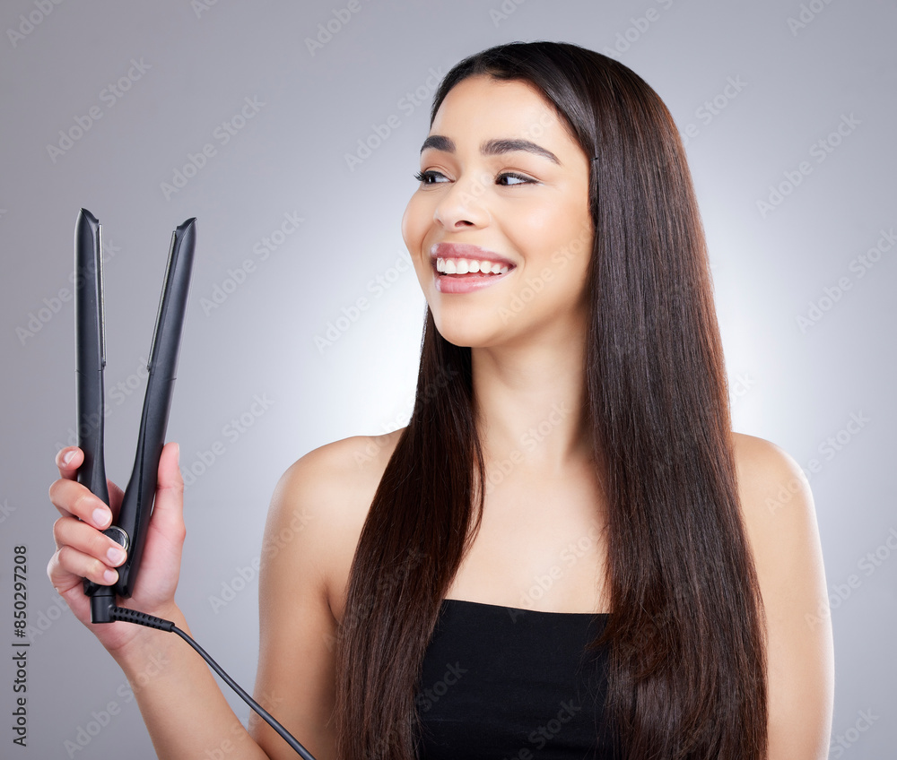 Girl, straightener and thinking in studio for hair care, keratin treatment and beauty tool for hairstyle. Woman, isolated and grey background with routine on healthy growth, flat iron and shine. Girl, straightener and thinking in studio for hair care, keratin treatment and beauty tool for hairstyle. Woman, isolated and grey background with routine on healthy growth, flat iron and shine.