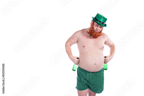 Funny fat man drinks green beer. White background.