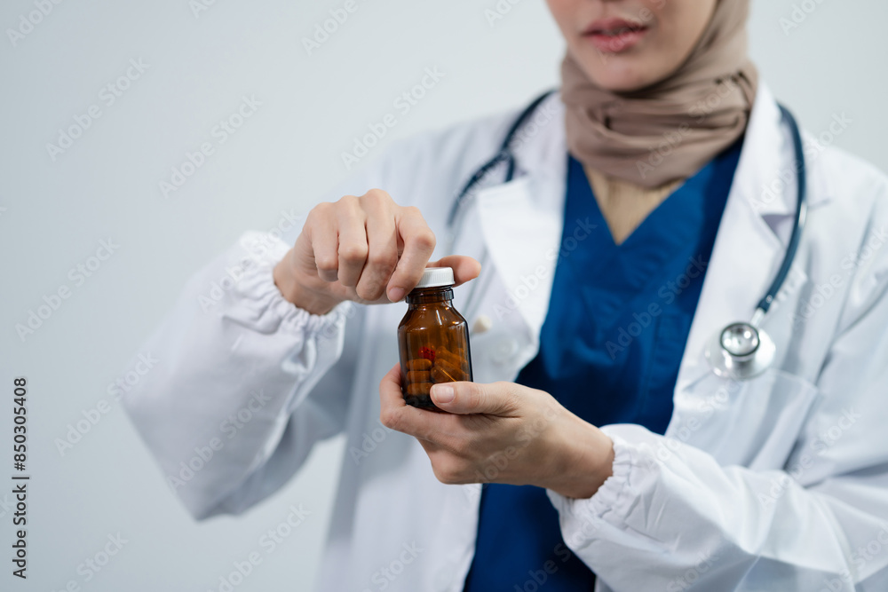 professional medical specialist in a white coat on a white background. professional medical specialist in a white coat on a white background.