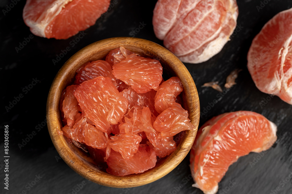 slices of peeled grapefruit close-up slices of peeled grapefruit close-up