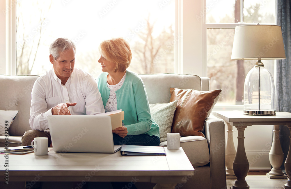 Documents, laptop and senior couple on sofa with financial report, insurance and investment in home. Retirement, marriage and mature man and woman on computer for finance planning, pension or savings Documents, laptop and senior couple on sofa with financial report, insurance and investment in home. Retirement, marriage and mature man and woman on computer for finance planning, pension or savings