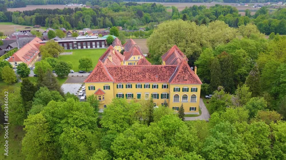 Laubegg Castle in Austria in Aerial Approaching shot Laubegg Castle in Austria in Aerial Approaching shot