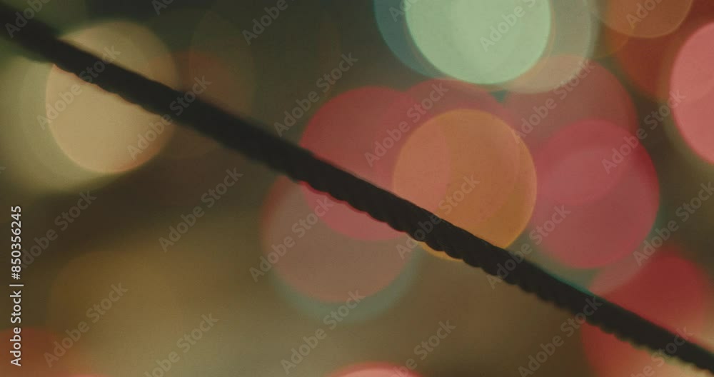 Blurred Background With Colorful Traffic Lights At Nighttime. Defocused Shot Blurred Background With Colorful Traffic Lights At Nighttime. Defocused Shot